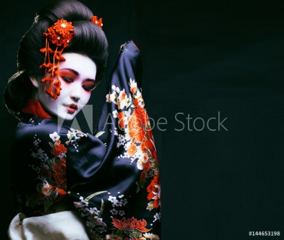 Bild på young pretty geisha in kimono